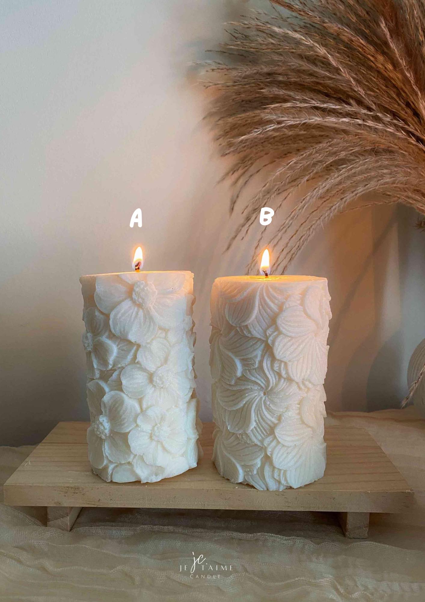 Two beautifully designed candles with floral and intricate patterns, adding elegance and warmth to any space.