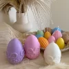 A cheerful assortment of colorful egg candles on a table, perfect for celebrating a joyful occasion.