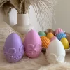 A cheerful assortment of colorful egg candles on a table, perfect for celebrating a joyful occasion.