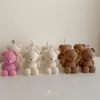 Handmade teddy bear candles in cream, pink and brown colors, crafted by Je T’aime Candle. Cute decorative bear-shaped candles, perfect for gifts, baby showers, weddings, or cozy home décor.