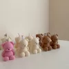 Handmade teddy bear candles in cream, pink and brown colors, crafted by Je T’aime Candle. Cute decorative bear-shaped candles, perfect for gifts, baby showers, weddings, or cozy home décor.