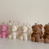 Handmade teddy bear candles in cream, pink and brown colors, crafted by Je T’aime Candle. Cute decorative bear-shaped candles, perfect for gifts, baby showers, weddings, or cozy home décor.