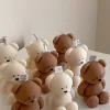 Handmade teddy bear candles in cream and brown colors, crafted by Je T’aime Candle. Cute decorative bear-shaped candles, perfect for gifts, baby showers, weddings, or cozy home décor.