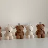 Handmade teddy bear candles in cream and brown colors, crafted by Je T’aime Candle. Cute decorative bear-shaped candles, perfect for gifts, baby showers, weddings, or cozy home décor.