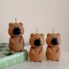 Handmade quokka candles with cute round shapes and big black noses, crafted by Je T’aime Candle. Unique novelty animal candles for gifts, home décor, and special occasions.