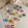 Explore these beautiful rose-shaped candles in vibrant colors like pink, blue, purple, yellow, green, and white. Perfect for weddings, baby showers, or special events, these handmade candles add a touch of elegance to any occasion