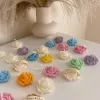 Explore these beautiful rose-shaped candles in vibrant colors like pink, blue, purple, yellow, green, and white. Perfect for weddings, baby showers, or special events, these handmade candles add a touch of elegance to any occasion