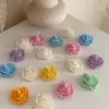 Explore these beautiful rose-shaped candles in vibrant colors like pink, blue, purple, yellow, green, and white. Perfect for weddings, baby showers, or special events, these handmade candles add a touch of elegance to any occasion