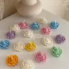 Explore these beautiful rose-shaped candles in vibrant colors like pink, blue, purple, yellow, green, and white. Perfect for weddings, baby showers, or special events, these handmade candles add a touch of elegance to any occasion