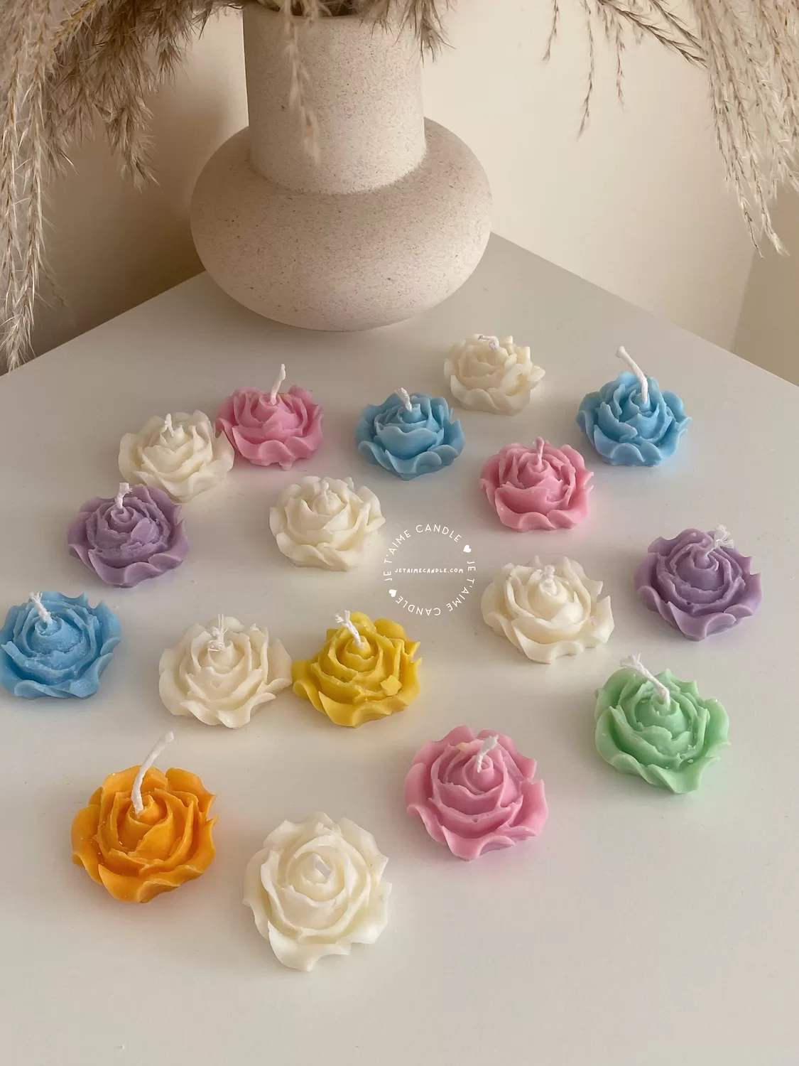 Explore these beautiful rose-shaped candles in vibrant colors like pink, blue, purple, yellow, green, and white. Perfect for weddings, baby showers, or special events, these handmade candles add a touch of elegance to any occasion