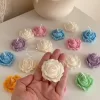 Explore these beautiful rose-shaped candles in vibrant colors like pink, blue, purple, yellow, green, and white. Perfect for weddings, baby showers, or special events, these handmade candles add a touch of elegance to any occasion