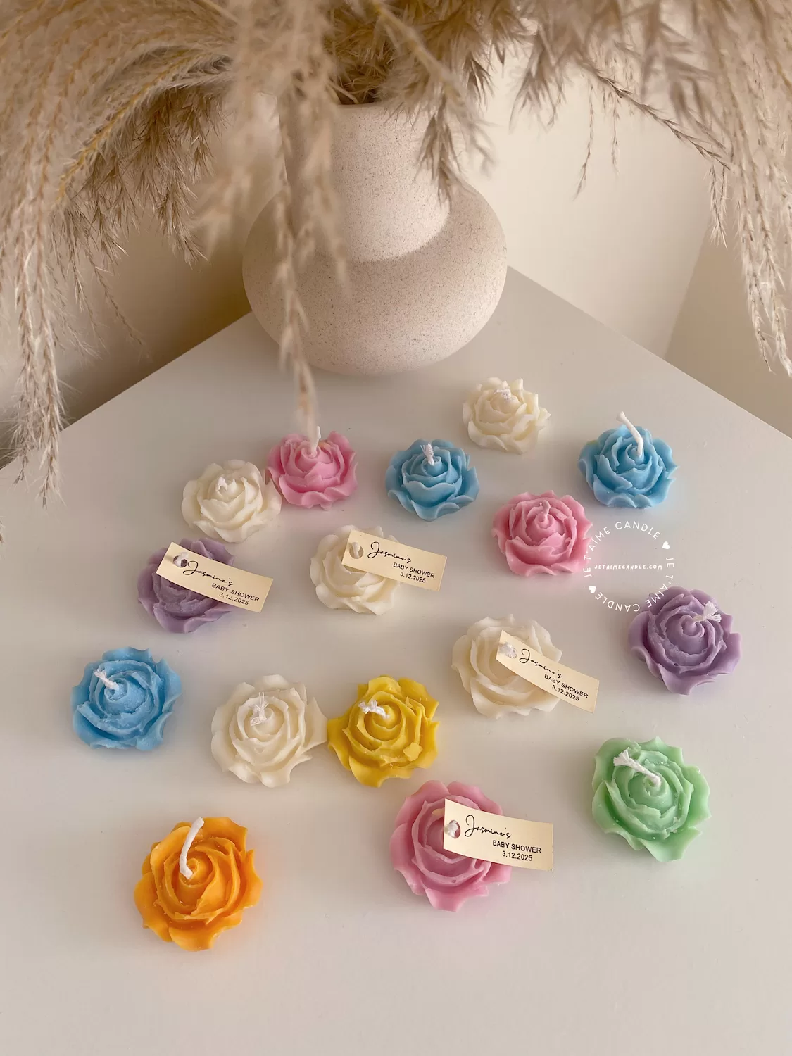 Explore these beautiful rose-shaped candles in vibrant colors like pink, blue, purple, yellow, green, and white. Perfect for weddings, baby showers, or special events, these handmade candles add a touch of elegance to any occasion
