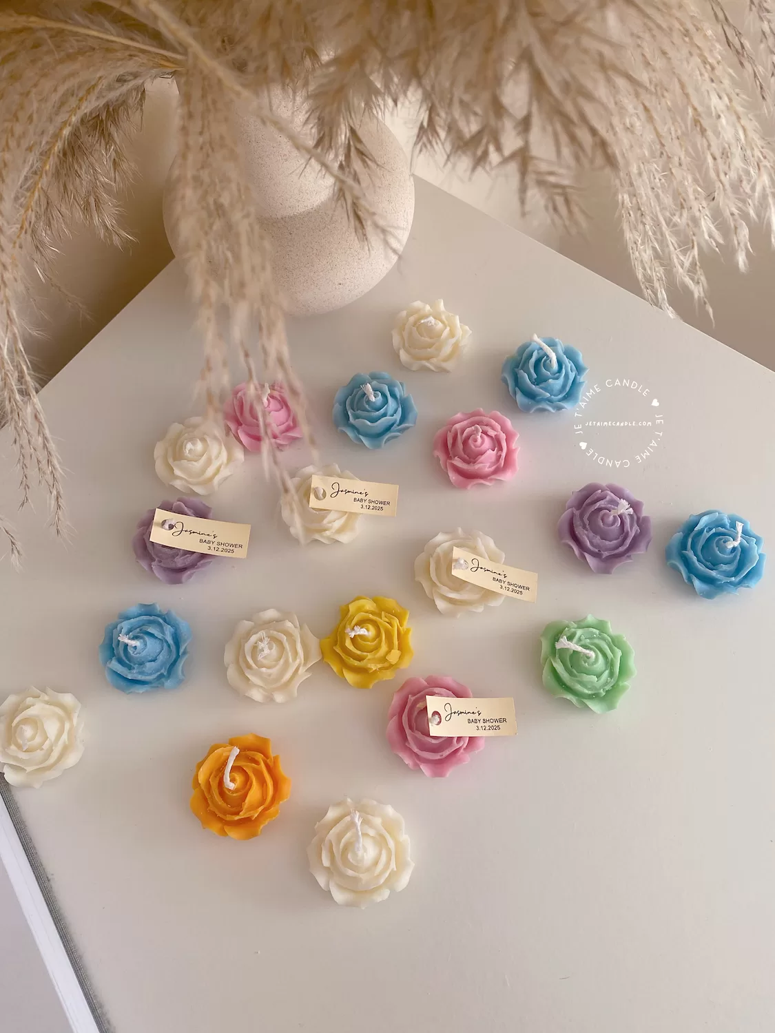 Explore these beautiful rose-shaped candles in vibrant colors like pink, blue, purple, yellow, green, and white. Perfect for weddings, baby showers, or special events, these handmade candles add a touch of elegance to any occasion