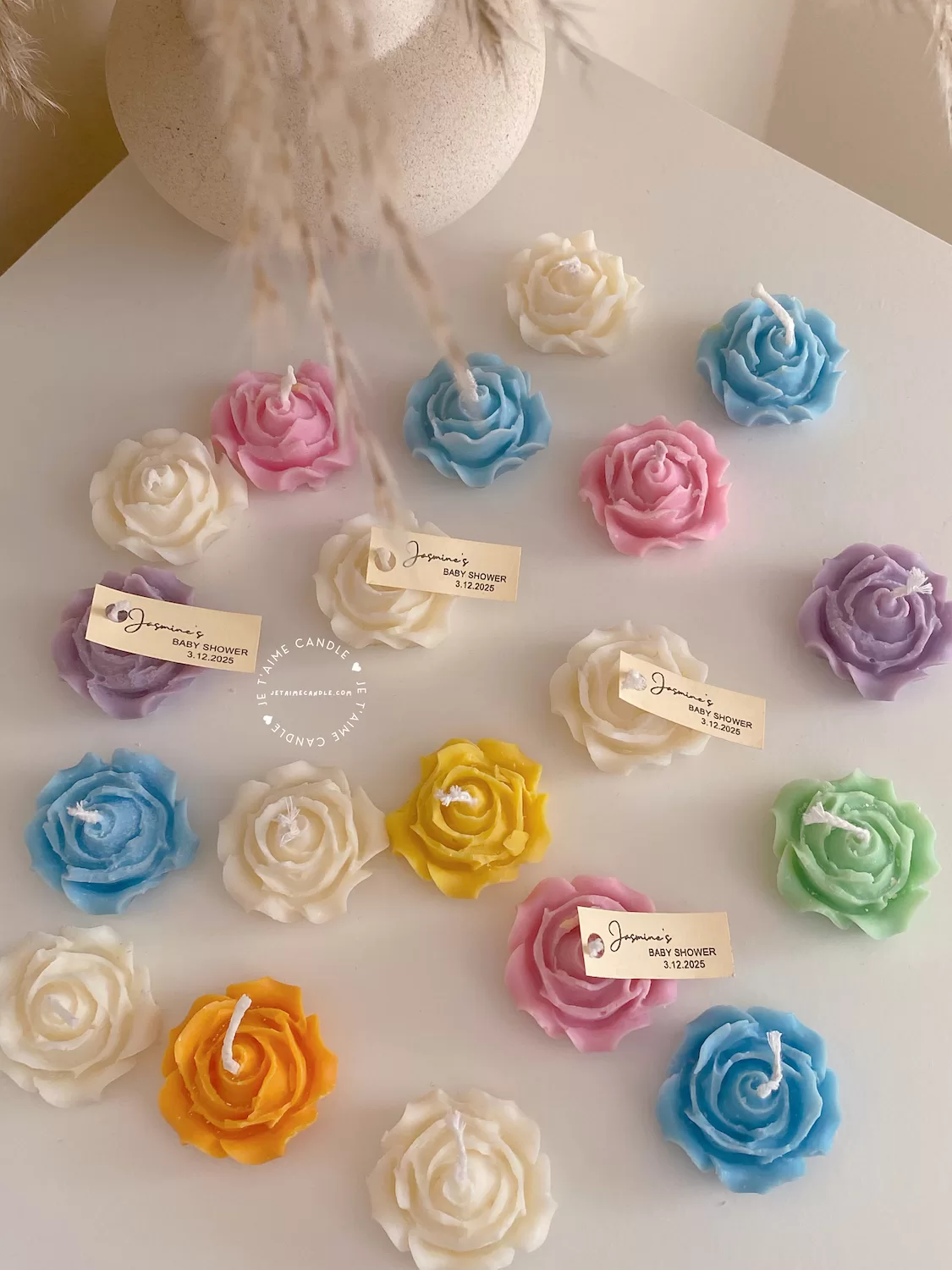 Explore these beautiful rose-shaped candles in vibrant colors like pink, blue, purple, yellow, green, and white. Perfect for weddings, baby showers, or special events, these handmade candles add a touch of elegance to any occasion
