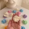 Explore these beautiful rose-shaped candles in vibrant colors like pink, blue, purple, yellow, green, and white. Perfect for weddings, baby showers, or special events, these handmade candles add a touch of elegance to any occasion