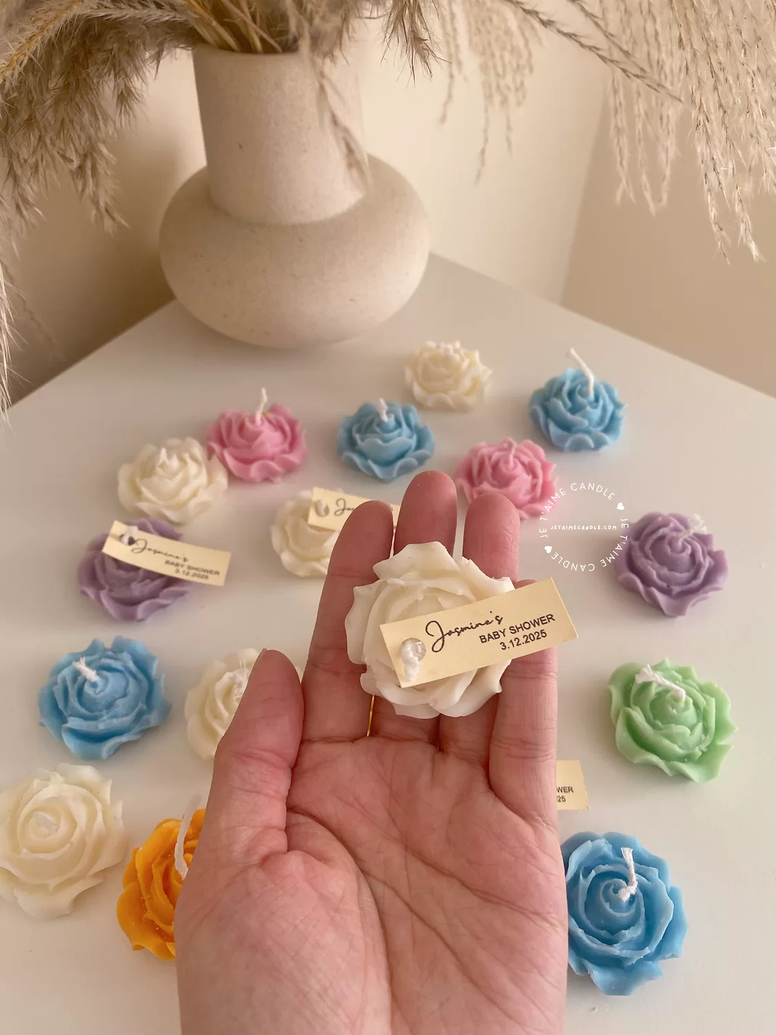 Explore these beautiful rose-shaped candles in vibrant colors like pink, blue, purple, yellow, green, and white. Perfect for weddings, baby showers, or special events, these handmade candles add a touch of elegance to any occasion