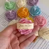 Explore these beautiful rose-shaped candles in vibrant colors like pink, blue, purple, yellow, green, and white. Perfect for weddings, baby showers, or special events, these handmade candles add a touch of elegance to any occasion