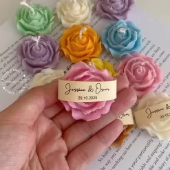 Explore these beautiful rose-shaped candles in vibrant colors like pink, blue, purple, yellow, green, and white. Perfect for weddings, baby showers, or special events, these handmade candles add a touch of elegance to any occasion