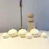 Chubby cat candle with dimensions 5x8x4cm, novelty soy wax gift for cat enthusiasts.