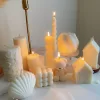 Handmade soy wax decorative candles in creamy white, including ribbed pillar, bubble cube, spiral twist, heart-shaped, bear-shaped, and swirl ball designs, lit for cozy aesthetic home décor, wedding table decoration, or unique gift ideas.
